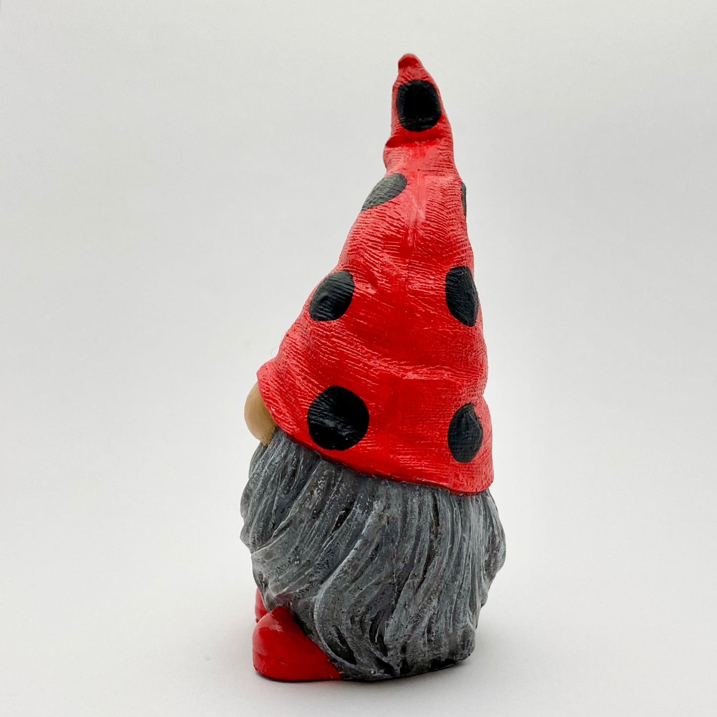 Hand Painted Gonk Statue with a Red and Black Spotty Ladybug Hat