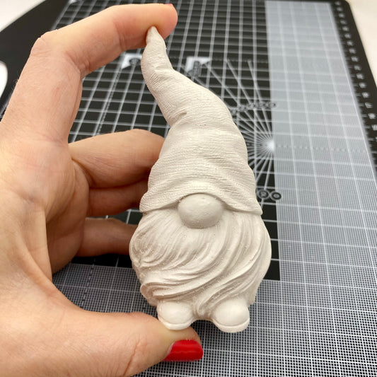 Hand Cast Plaster Gonk Statue ready to paint. Held to show size.