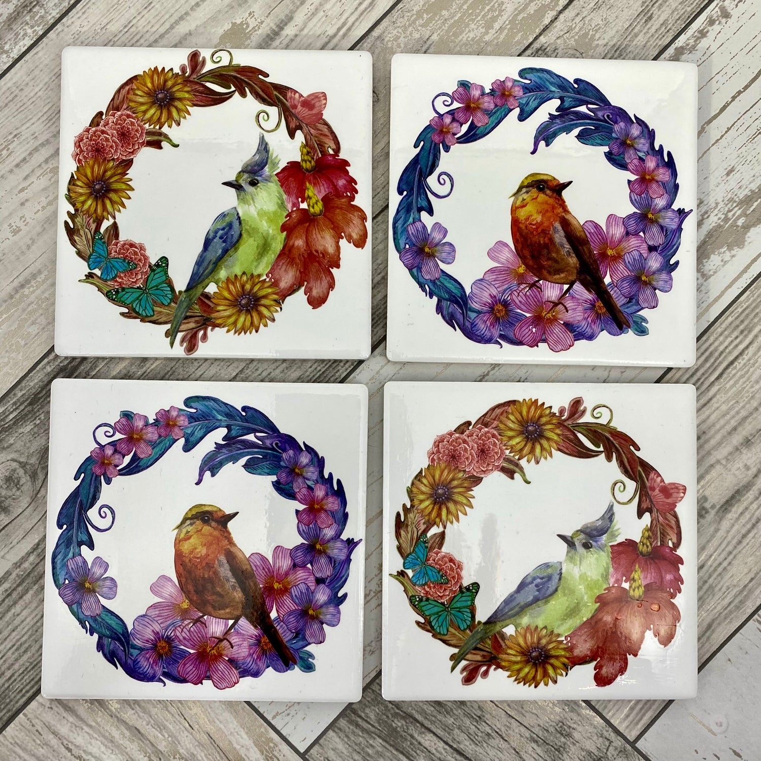 A trio of festive handpainted gonk statues