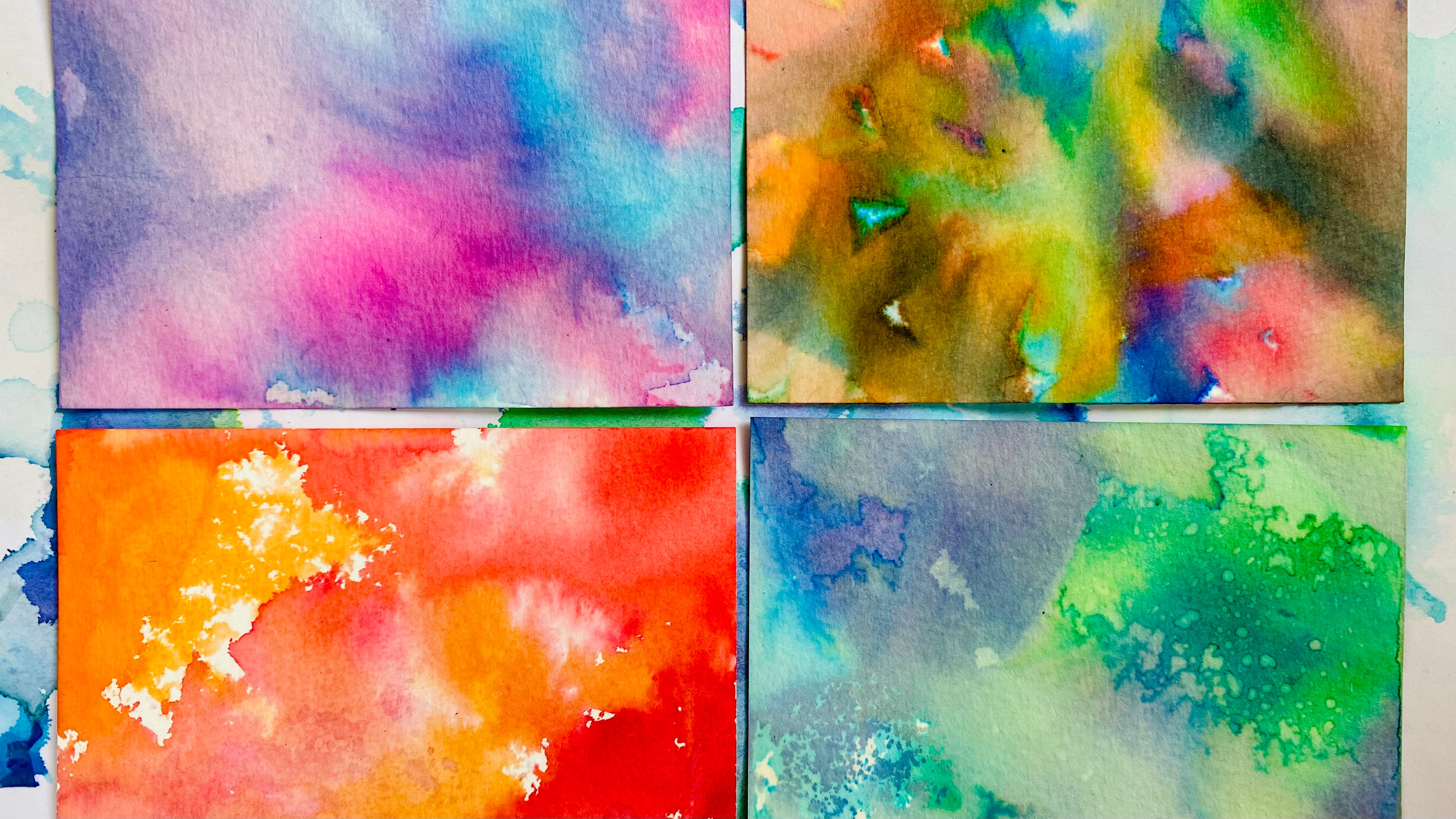 4 tissue paper art prints showing the different effects that can be made. All brightly coloured with blended areas and mottled areas