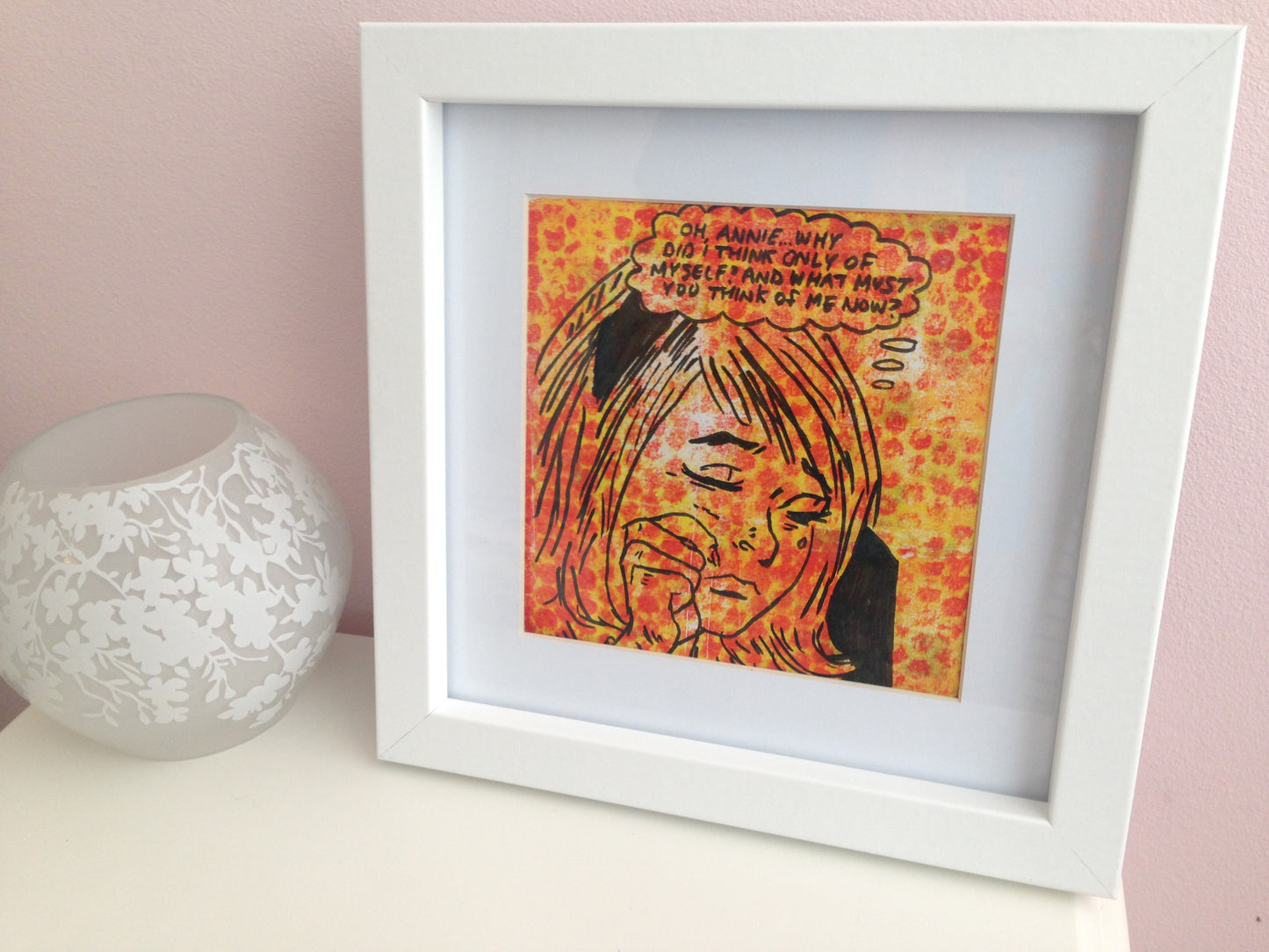 Framed yellow, red and black monoprint of a vintage inspired female character