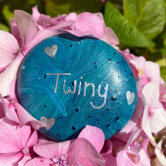 Marbled Stone with the word 'Twiny' written on in silver