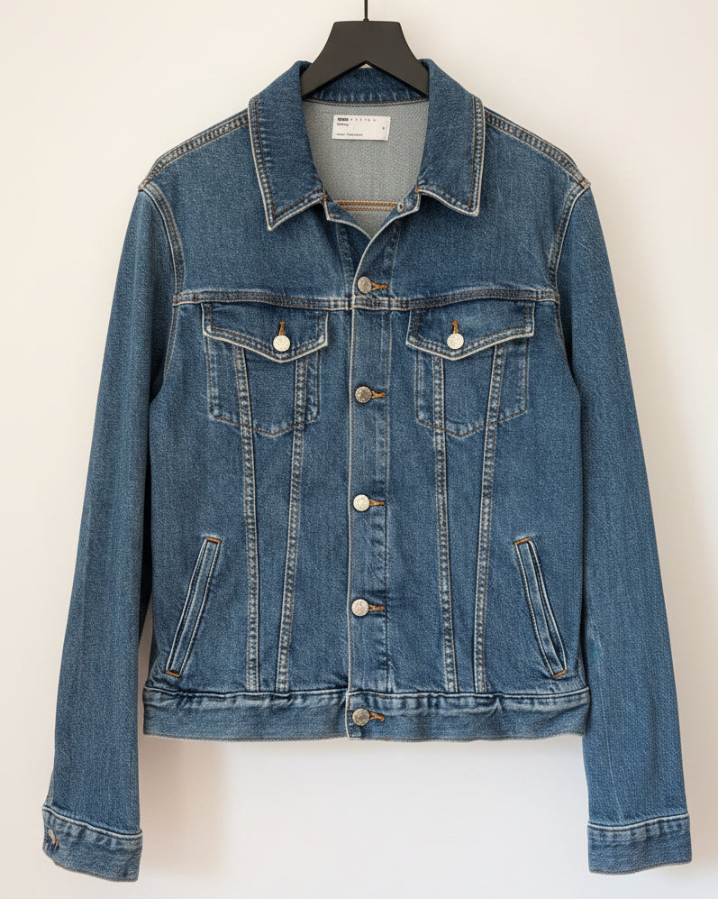 Blue denim jacket on a white background