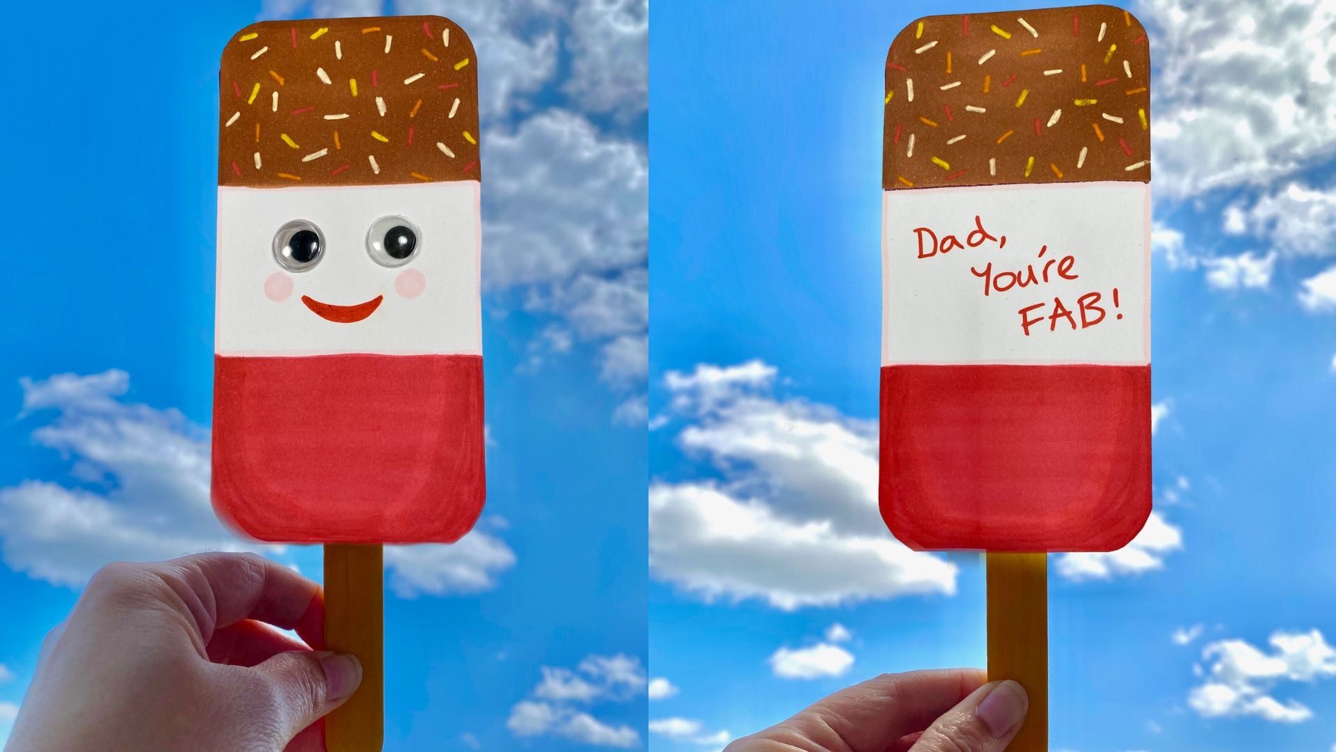 A handmade card in the shape of a Fab lolly on a wooden stick being held up to a blue sky. Both sides are pictured, one side has a smiley face with googley eyes and the other side has a written message: Dad, you're FAB!