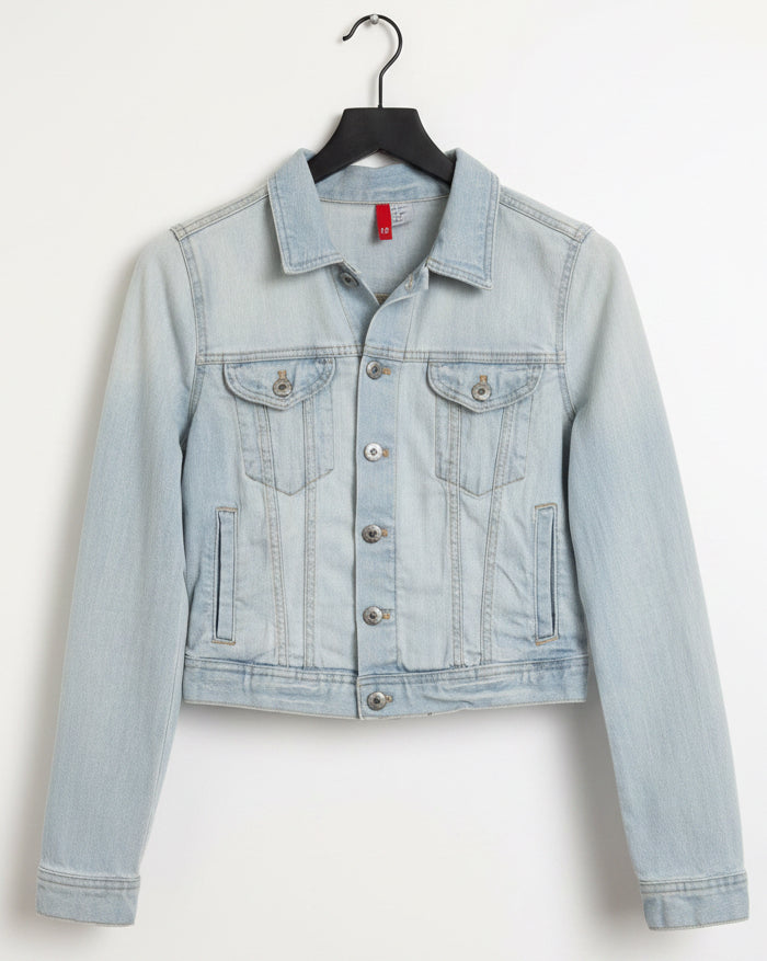 Light blue denim jacket on a hanger