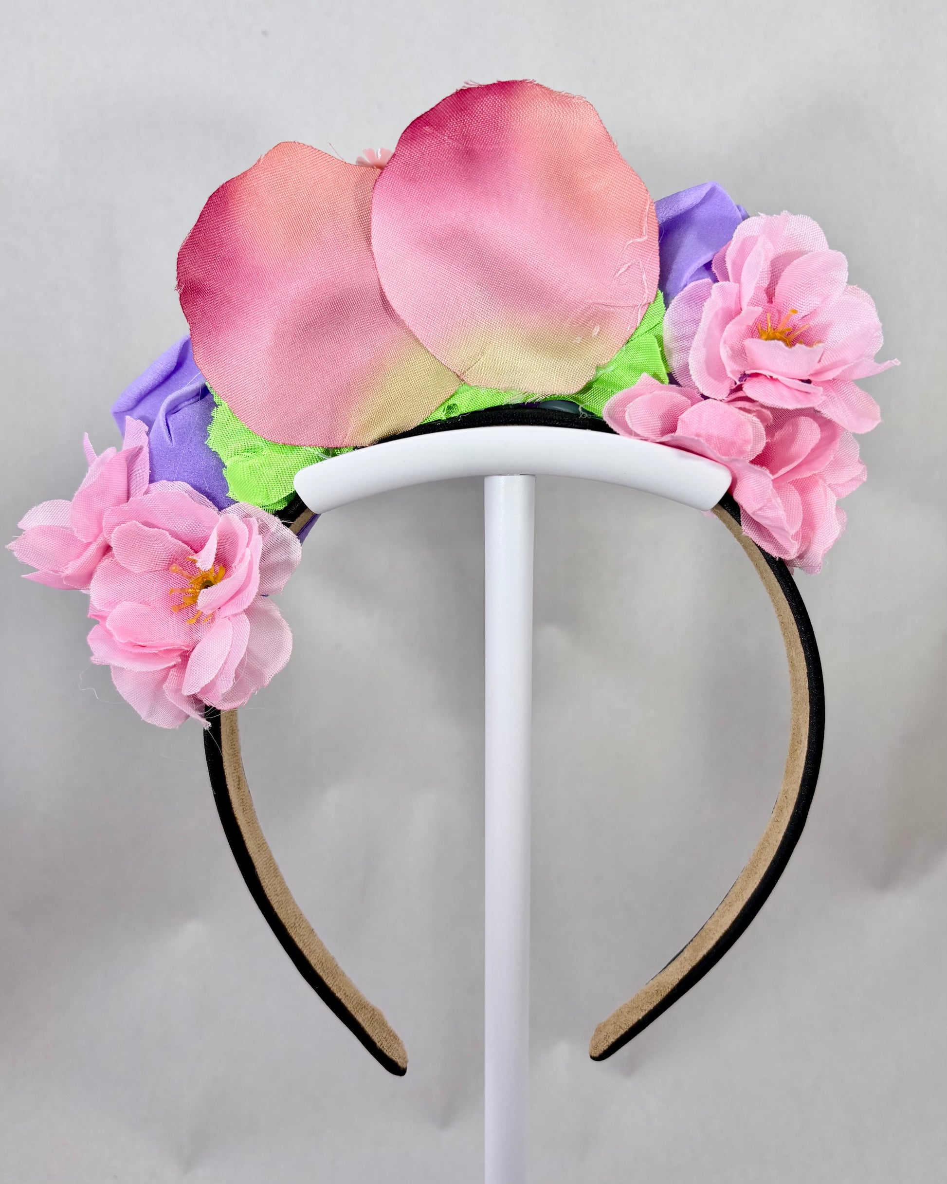 Headband with purple and pink flowers back view