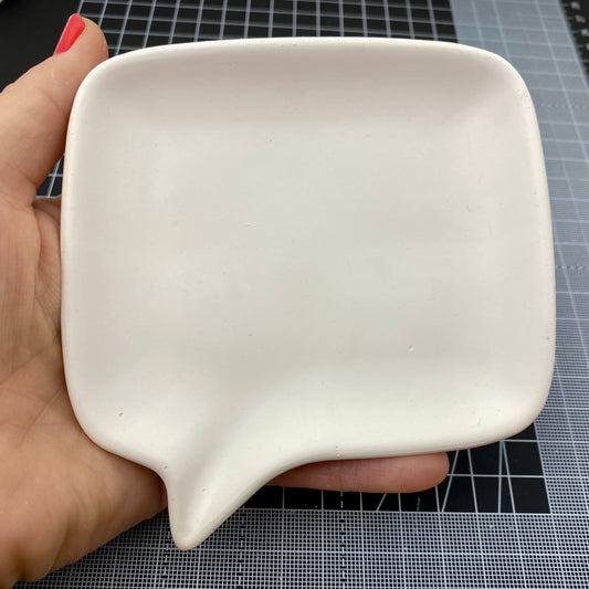 Hand Cast Plaster Speech Bubble Trinket Tray ready to paint. Held to show size.