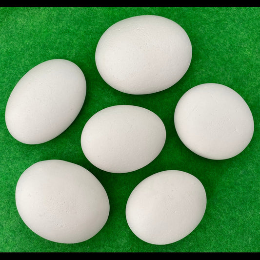6 large white plaster pebbles of different shapes and sizes