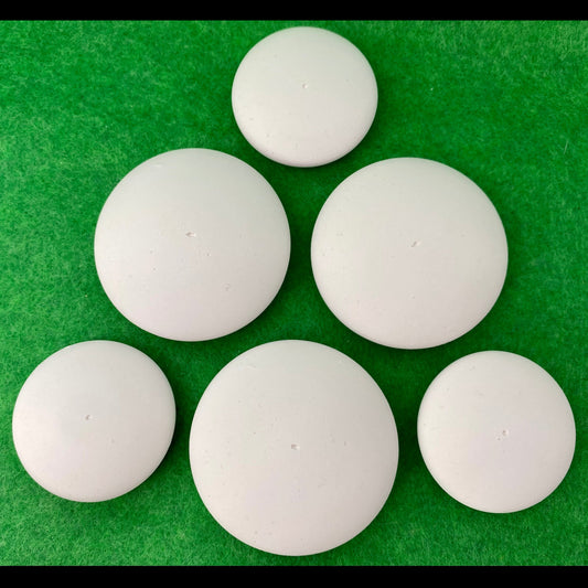 6 small white circular plaster pebbles in 2 sizes, each with a tiny centre hole to help with painting mandalas