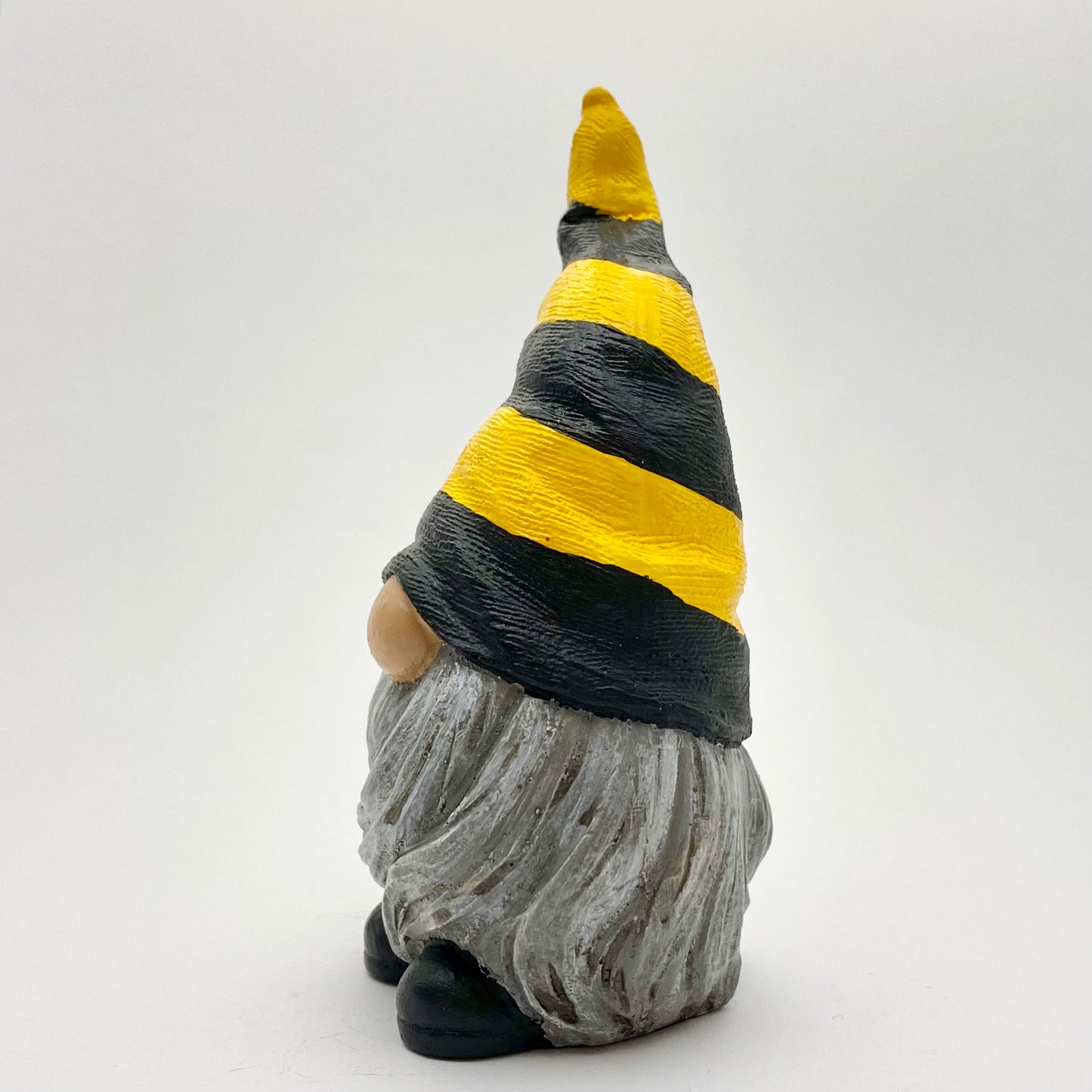 Hand painted Gonk statue with yellow and black striped Bee Hat