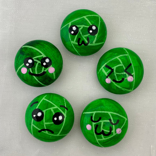 5 Hand painted tiny sprout pebbles each with a different cute faced expression