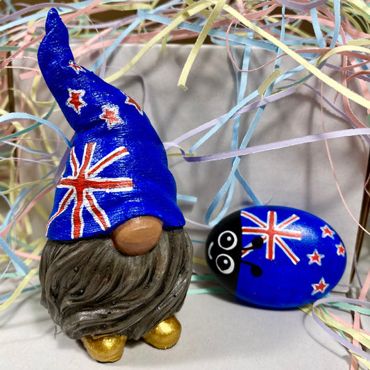 Hand painted Gonk statue with Australia Flag hat and matching bug
